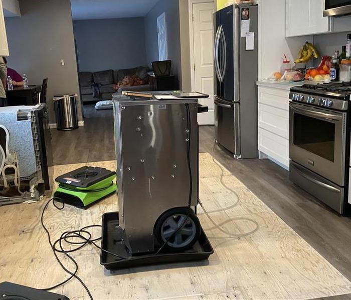 Heaters and air mover in a kitchen